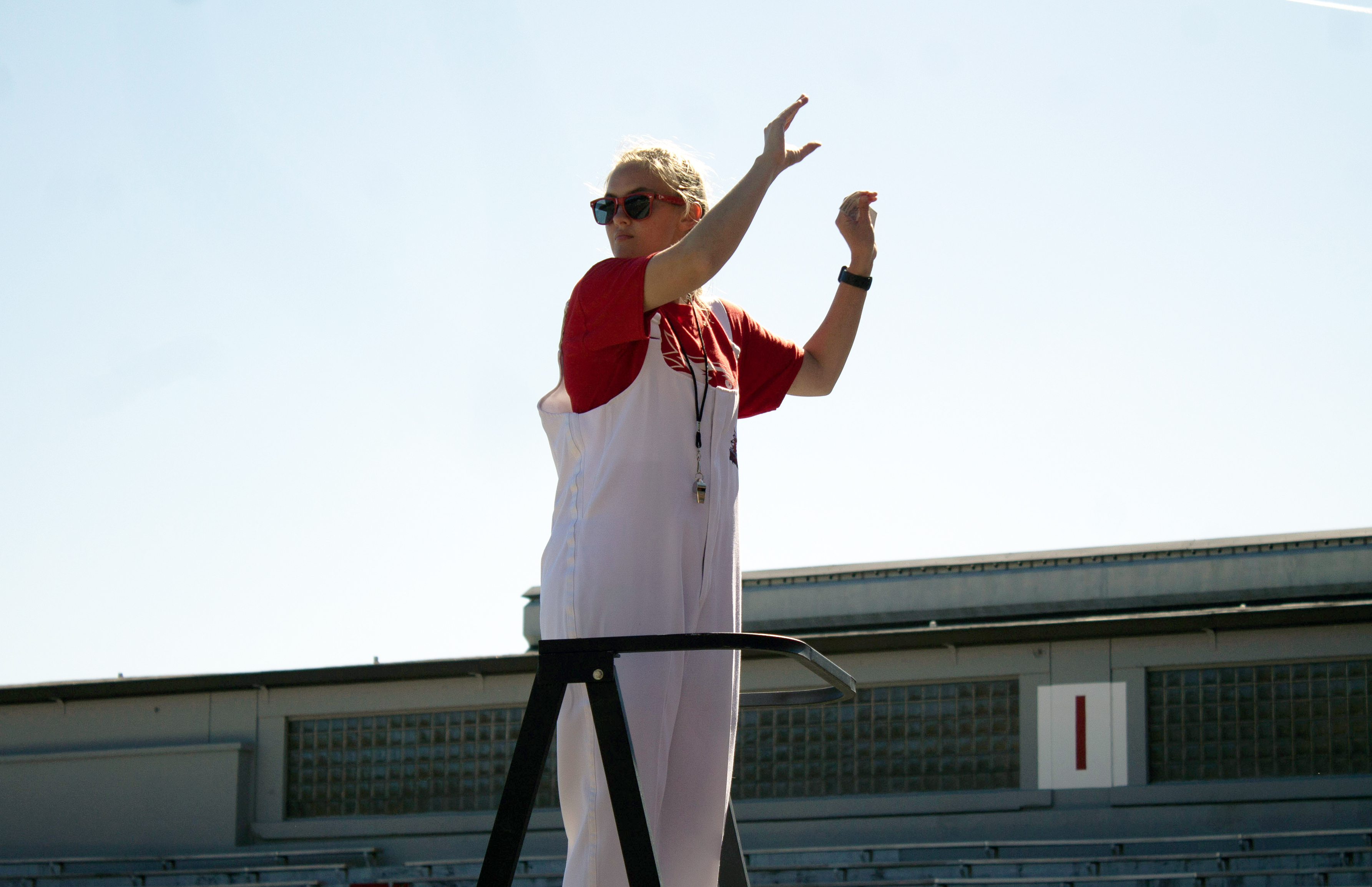 Image of Southeast student Rachel Richardson conducting the Southeast Marching Band.