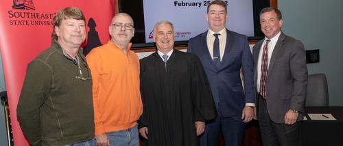 Mike Martin, Tim Martin, and David Martin pose with Judge Robert Mayer and former Board of Governors President Ed Gargas when David Martin was sworn into the Board of Governors as a new member in 2022