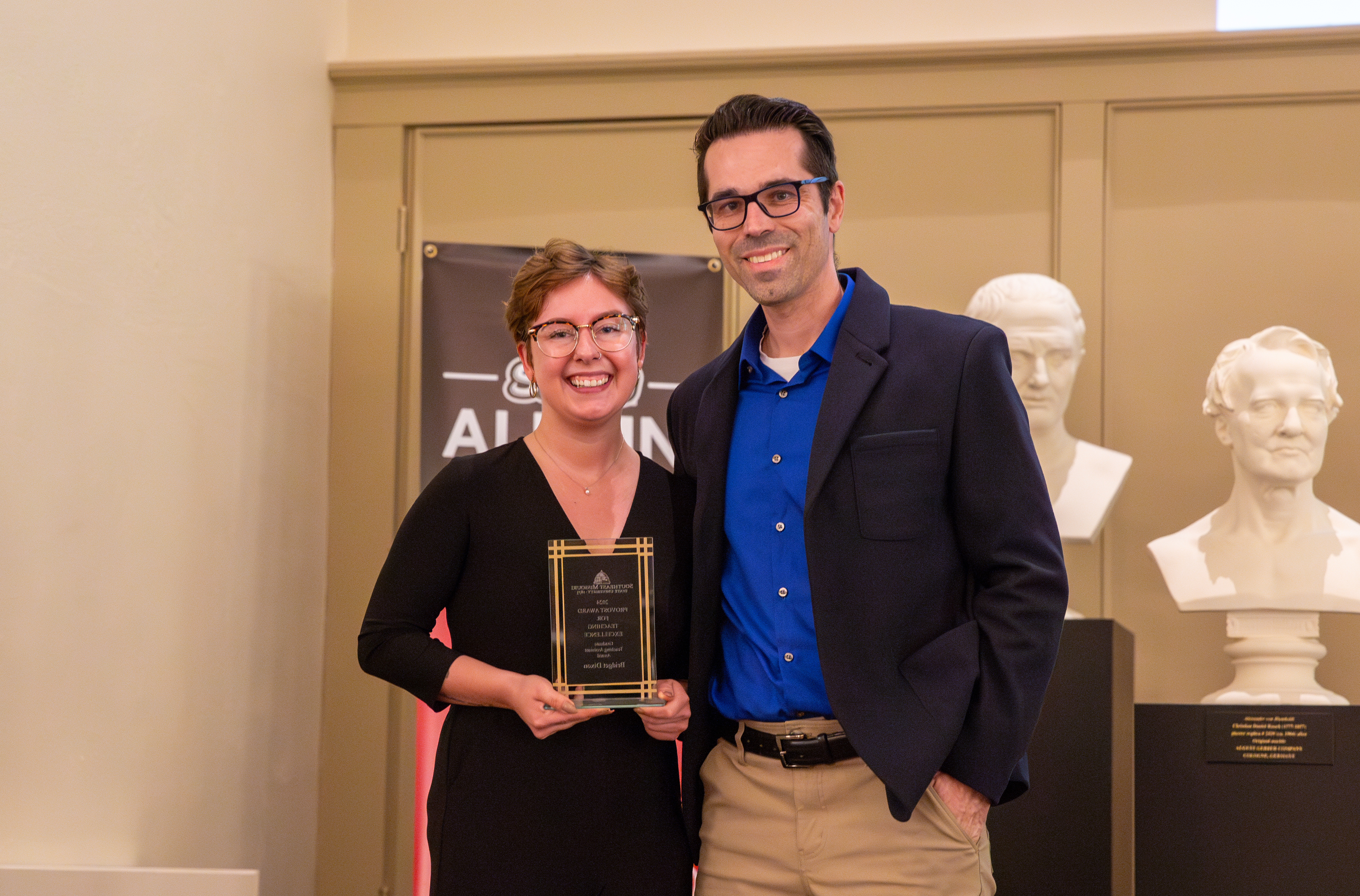 Bridget Dixon receives her graduate teaching assistant award. 