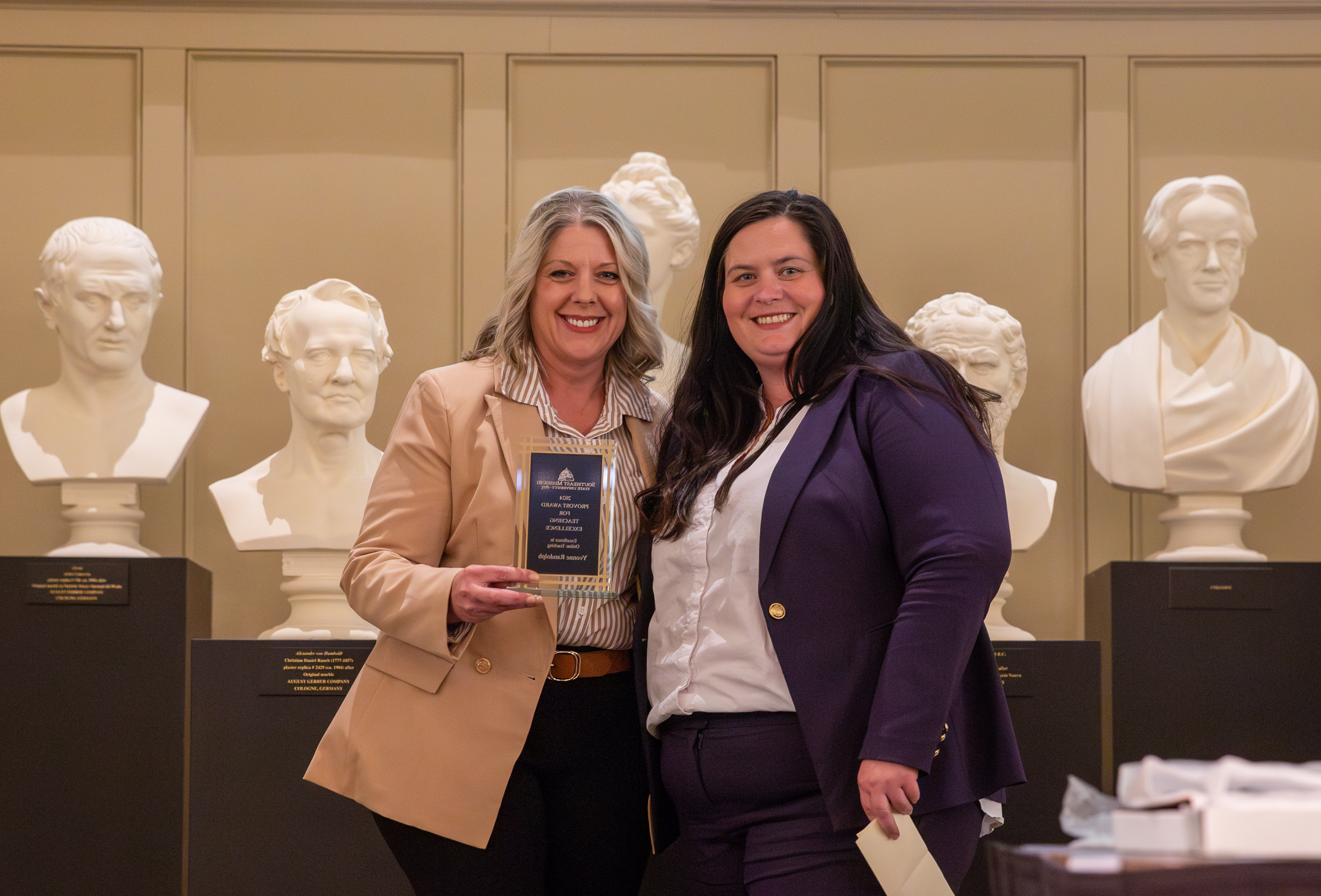 Yvonne Randolph receives her teaching award.