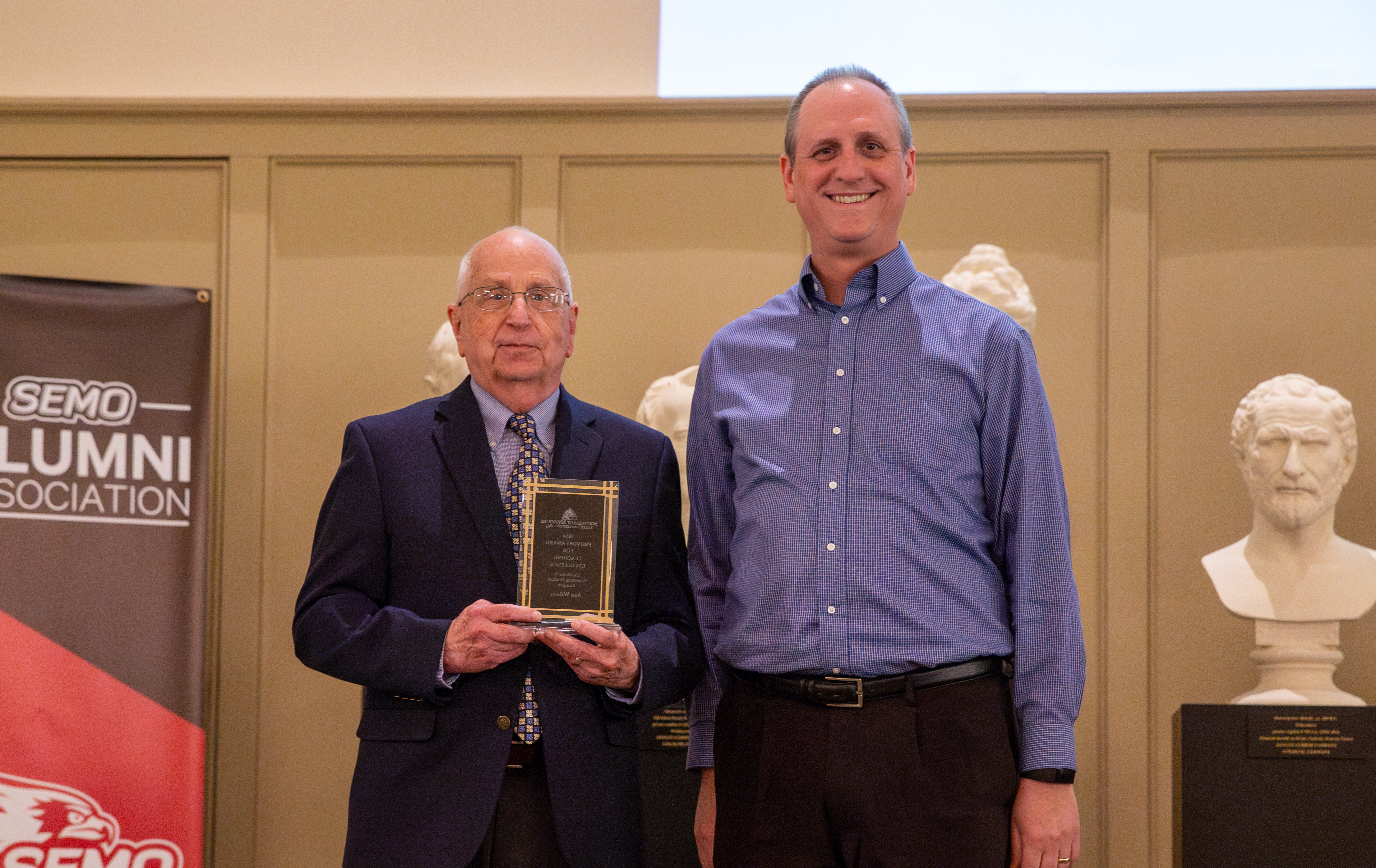 Asa Wilson receives his teaching award.