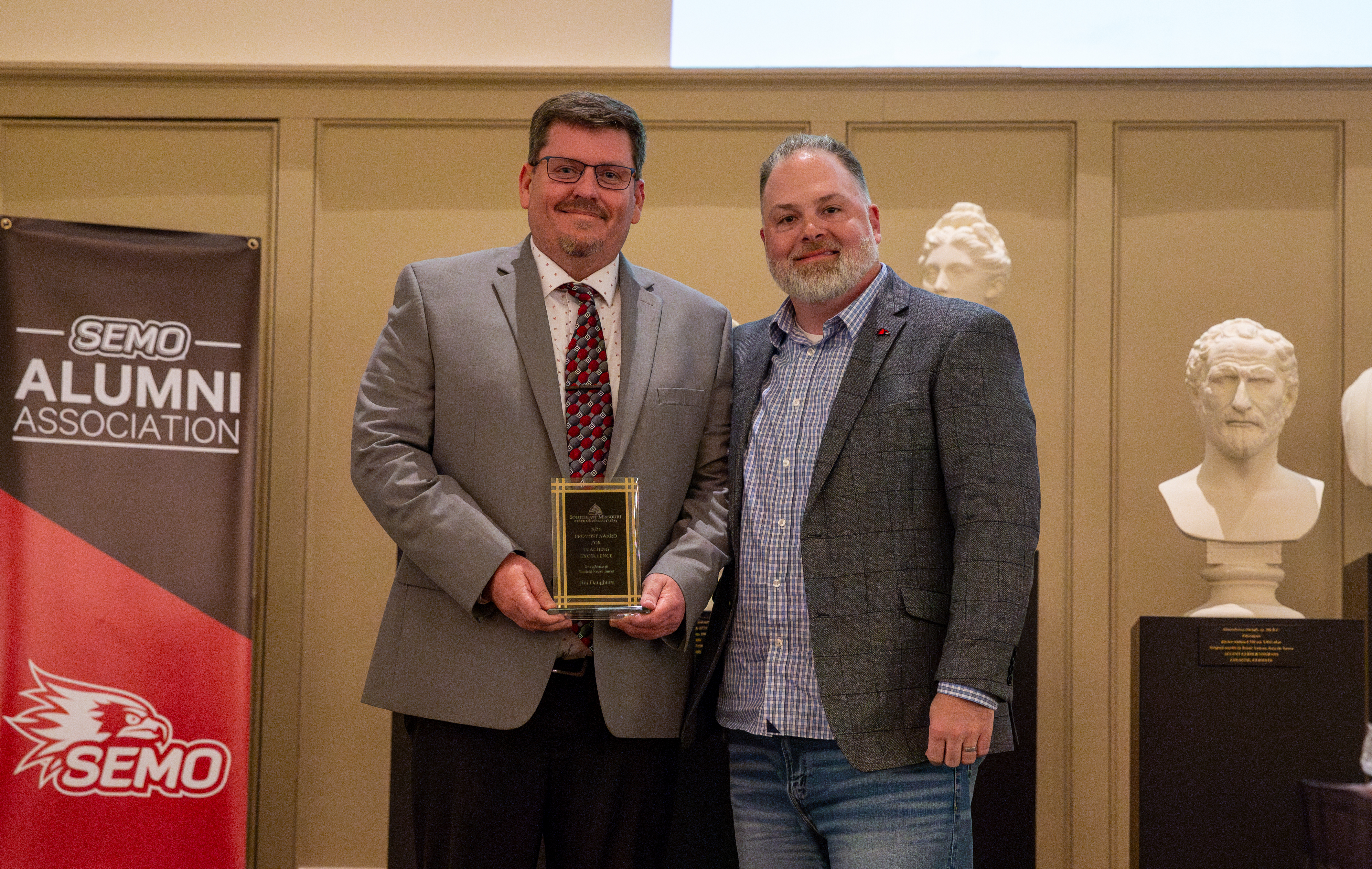 Jim Daughters receives his teaching award.