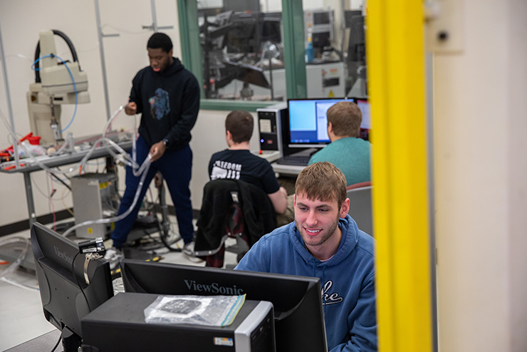 SEMO students in an industrial science lab.