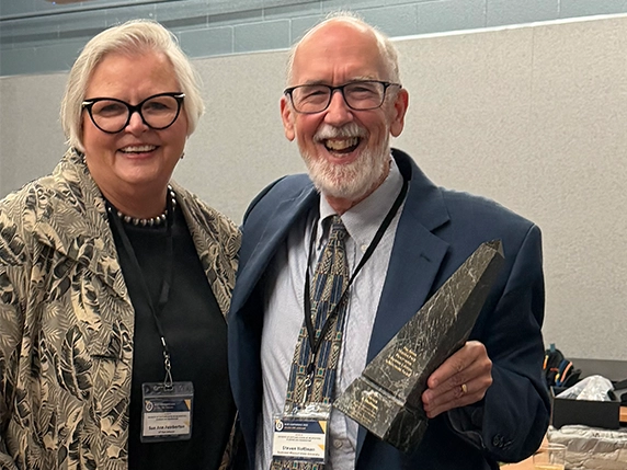 Professor Steven Hoffman smiles after winning the James Marston Fitch award.