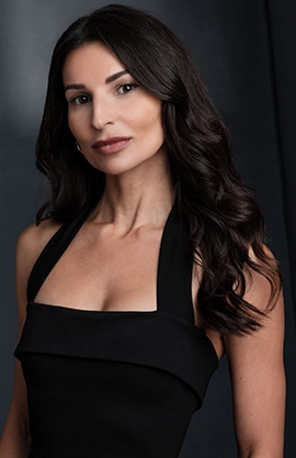 A professional headshot of Martyna Majok against a dark background.