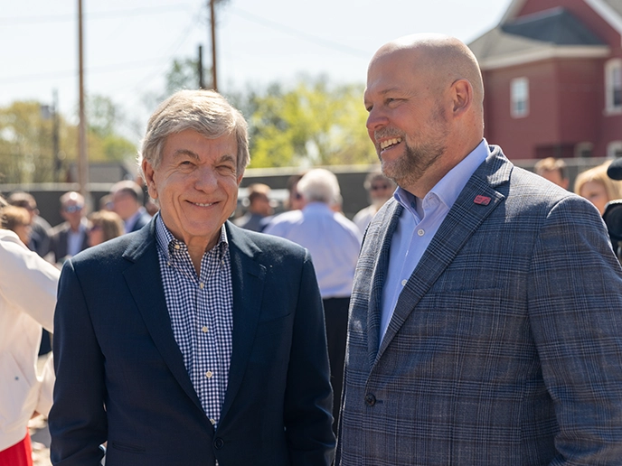 Senator Roy Blunt and President Hodson speak at an event.
