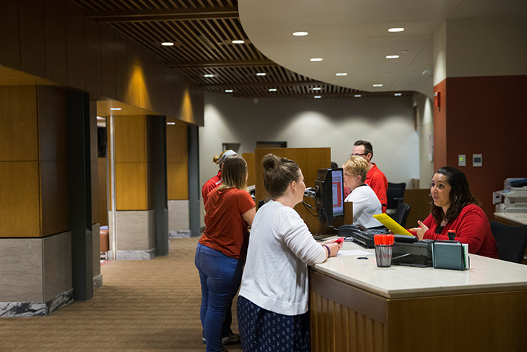 Students at the Student Financial Services desk in Academic Hall at SEMO.