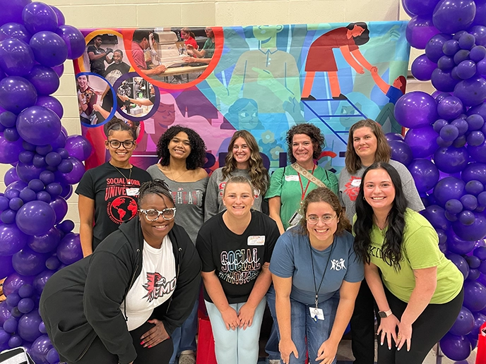 SEMO social work students stand and smile for a group photo at the Project Hope event.