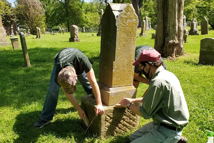 Students at Lorimier Cemetery for the Center of Regional History learning about the historic site. 