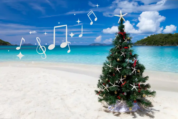 A Christmas tree on a tropical beach with starfish and bows as ornaments, and musical notes beside it
