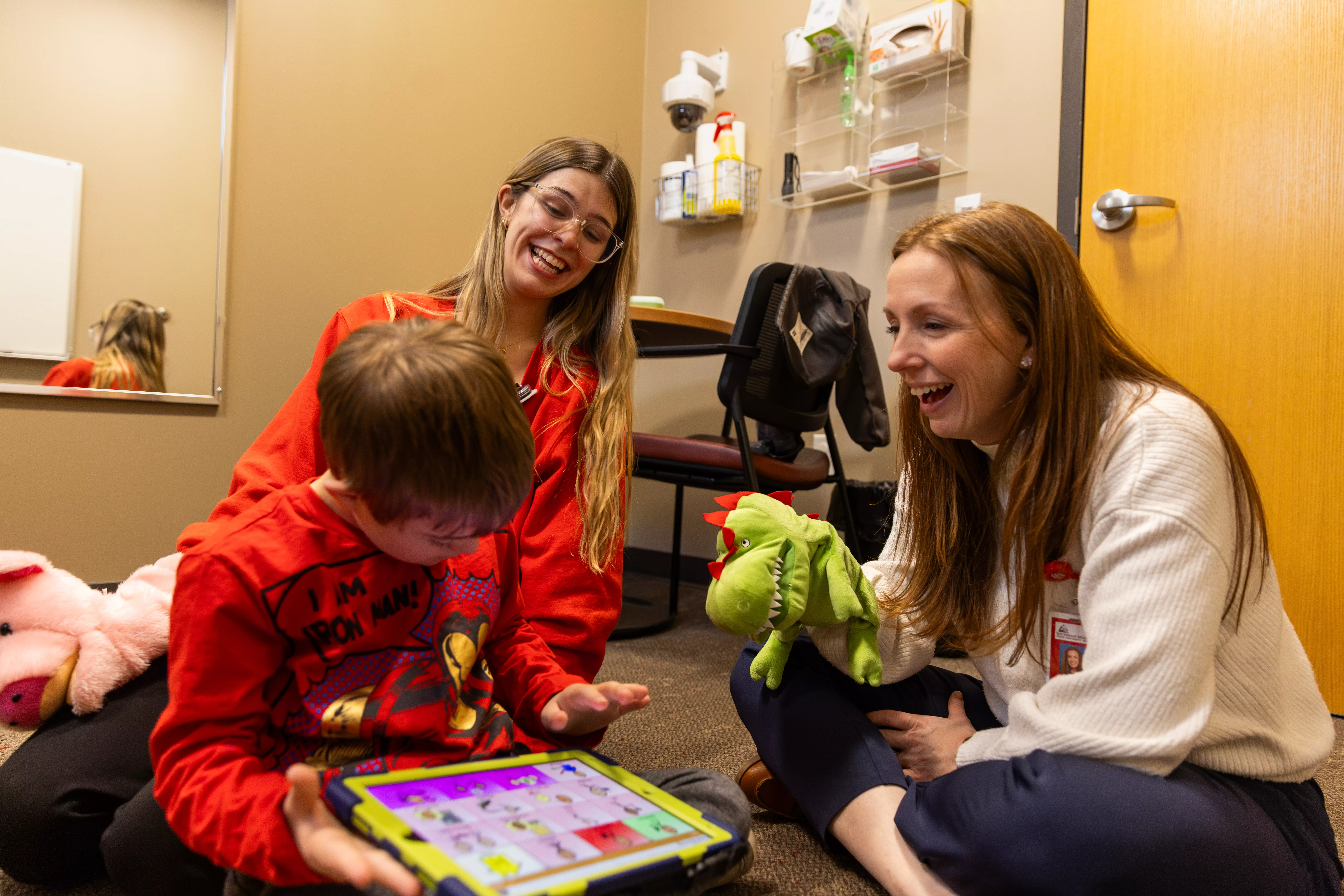 speech and hearing communications disorders students work with a patient for hands on learning