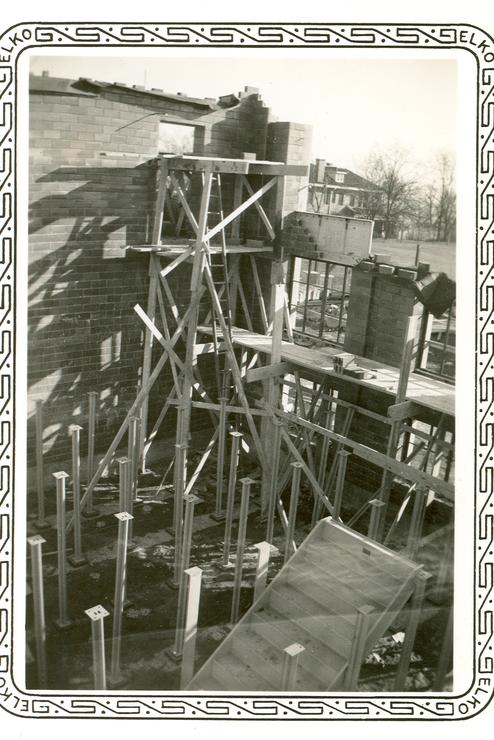 Cheney Hall being constructed, the framework of the building is taking shape.