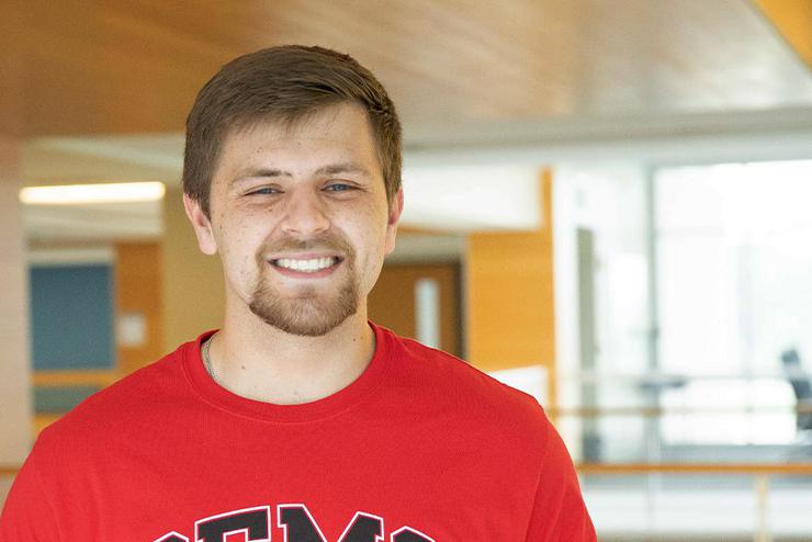 Southeast Alum Jarett Seabaugh smiles into the camera