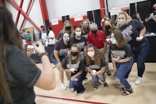 students at ice cream pigout smiling for a photo