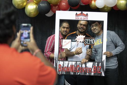 students taking a picture at welcome back picnic