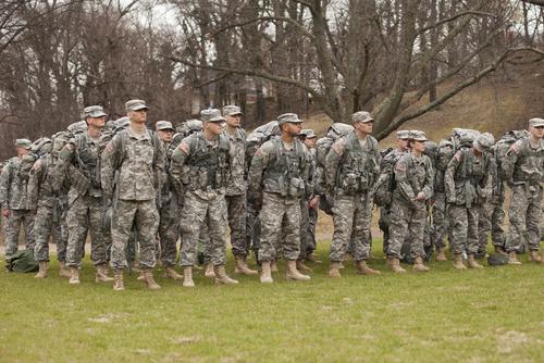 Military students outside in formation practicing