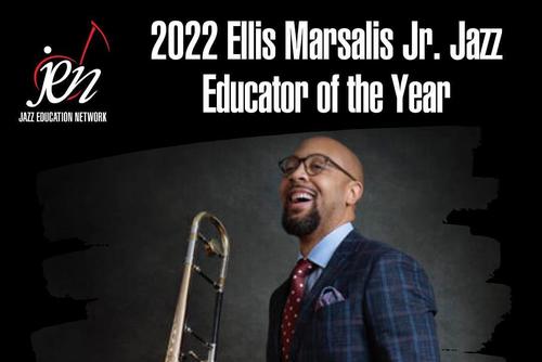 Dr. Joseph Jefferson smiles and holds his trombone and the text 2022 Ellis Marsalis Jr. Educator of the Year is above him.