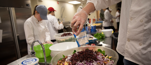 Students preparing fresh food in lab