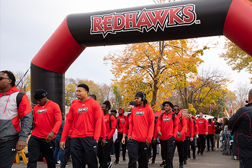 SEMO Football doing the Redhawk Walk before Game