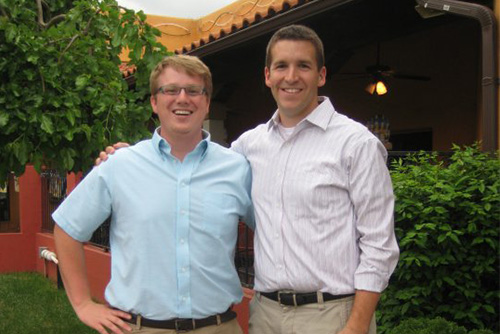 Nate and George standing next to each other smiling