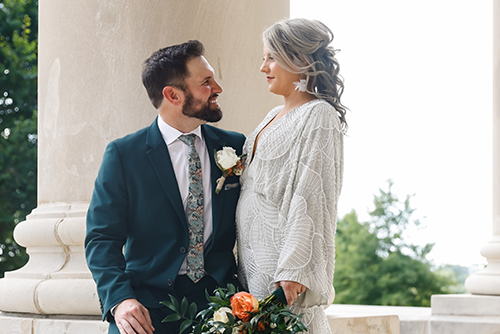 Katie and Matt looking at each other outside of Academic