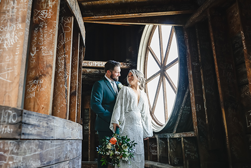 Katie and Matt inside the dome smiling at each other
