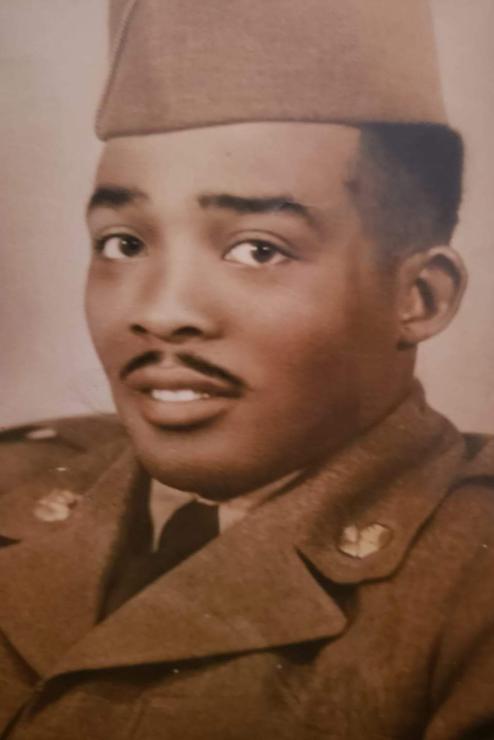 Historic photo of man in military uniform.