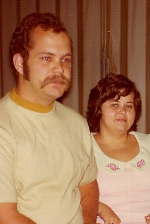 In an old photo, Ron and Jan sit side by side.