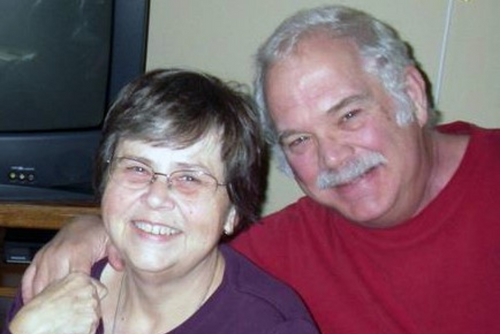 Ron and Jan smile for a photo.