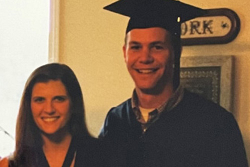 Emily and D.J. standing together with before D.J. graduates