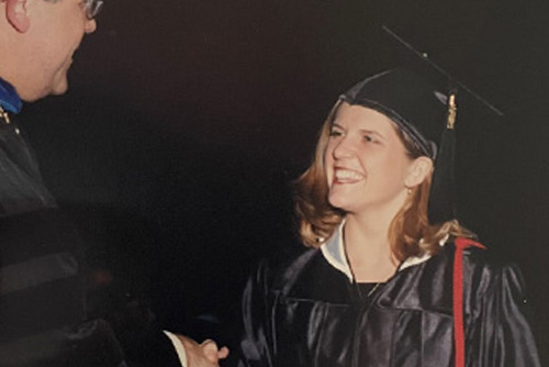Emily receiving her diploma from University president  Ken Dobbins in 2001