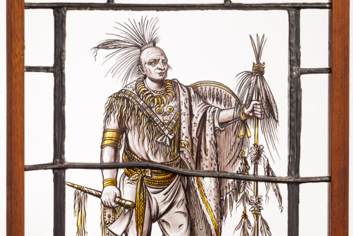 An illustration of a Native American chief on a window pane.
