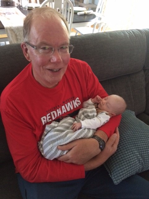 miodunski-2021-holding-my-newest-grandson-wearing-semo-gear.jpg