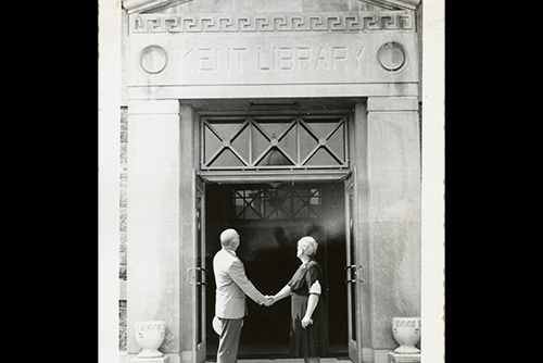 A woman, Sadie Kent, shakes hands with a man outside the brand new Kent Library.