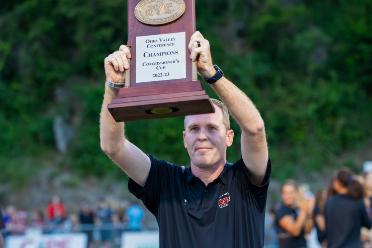 Brady Barke holds up Commissioners Cup trophy.