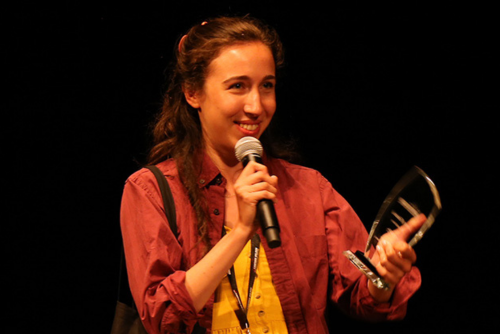 Avery Deutsch accepts award for Winter Guard Play