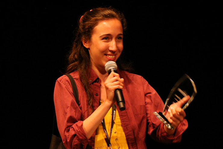 Avery Deutsch accepts award for Winter Guard Play