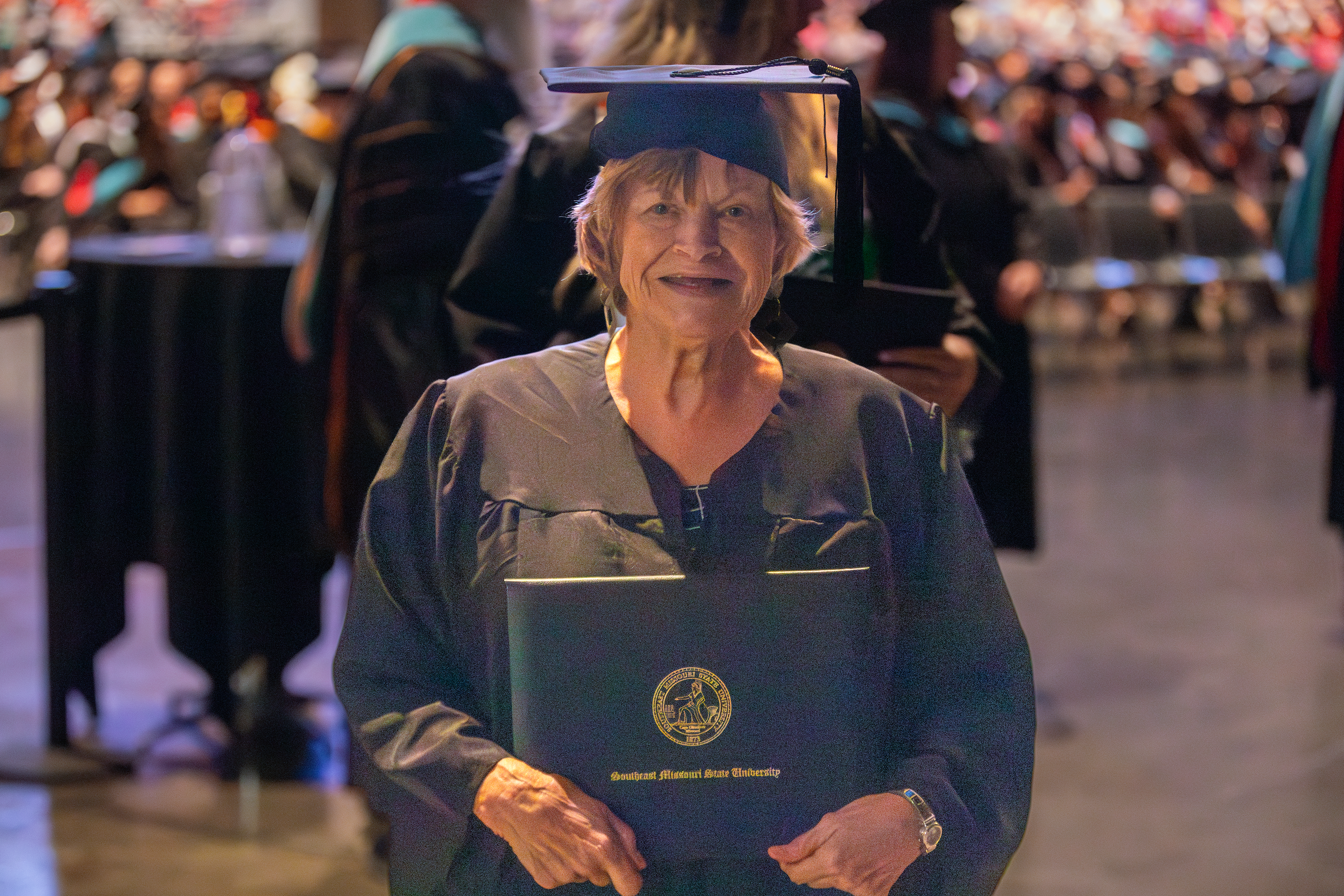 Shirley Bentley with her diploma at graduation.