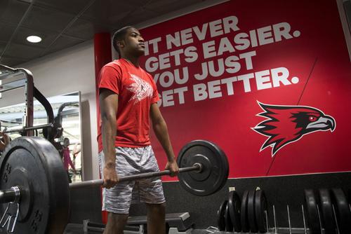 Southeast Missouri State University student performing a deadlift in the Student Recreation Center weight room.