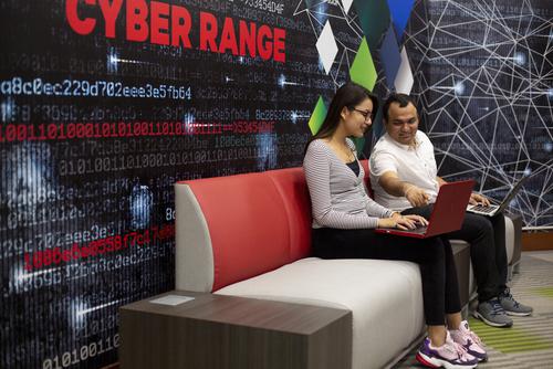 Two students working together in the CyberRange