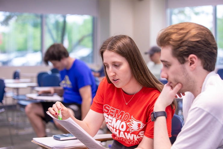 A student being helped by someone from health and wellnes to better understand their situation at SEMO's campus