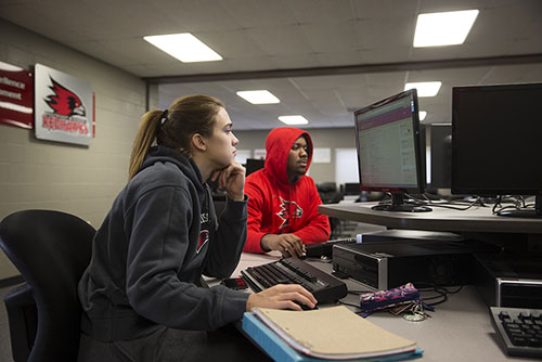 A SEMO tutor helps a Southeast student in the Academic Support Center.
