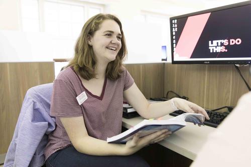 A SEMO tutor quizzes a Southeast student in the Academic Support Center