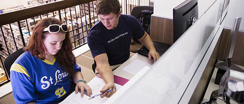 Students assist one another at the TRIO/Educational Access programs office