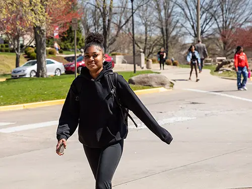 a SEMO student crosses campus in between classes