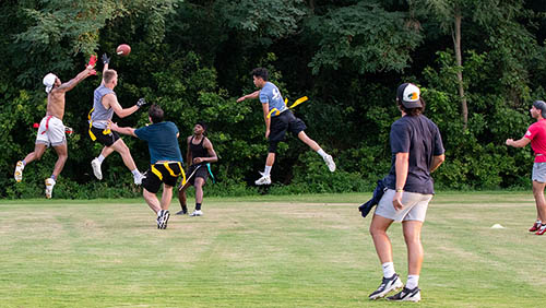 students at Southeast mIssouri  State University play flag football on rec servics intramural field