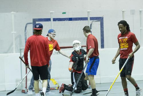 Students play floor hockey at Parker Gym’s Dashboard court.
