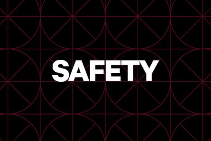 The word "Safety" in white on a black background.